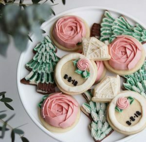 Engagement buttercream frosted sugar cookies with personalized wedding date. The hutch oven