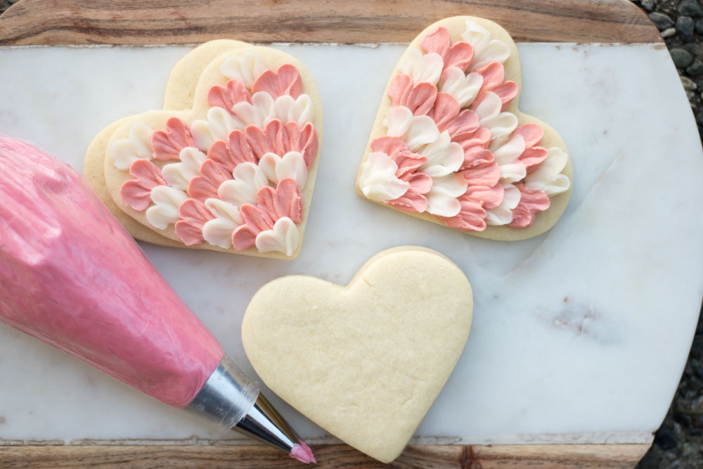 buttercream frosted heart cookies for valentines day